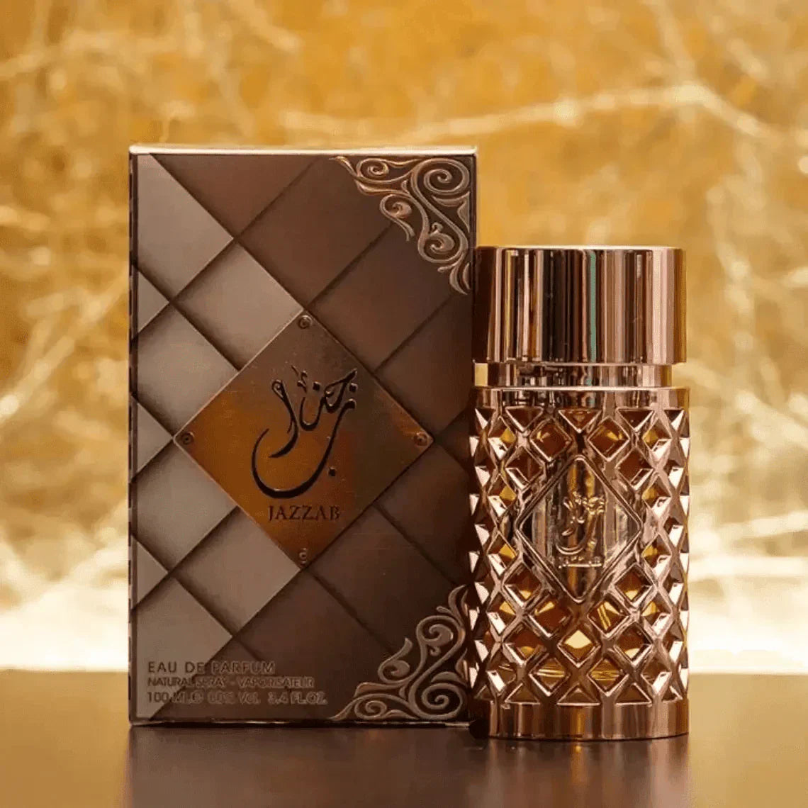 Jazzab Gold 100ml fragrance – bottle and box on golden marble background