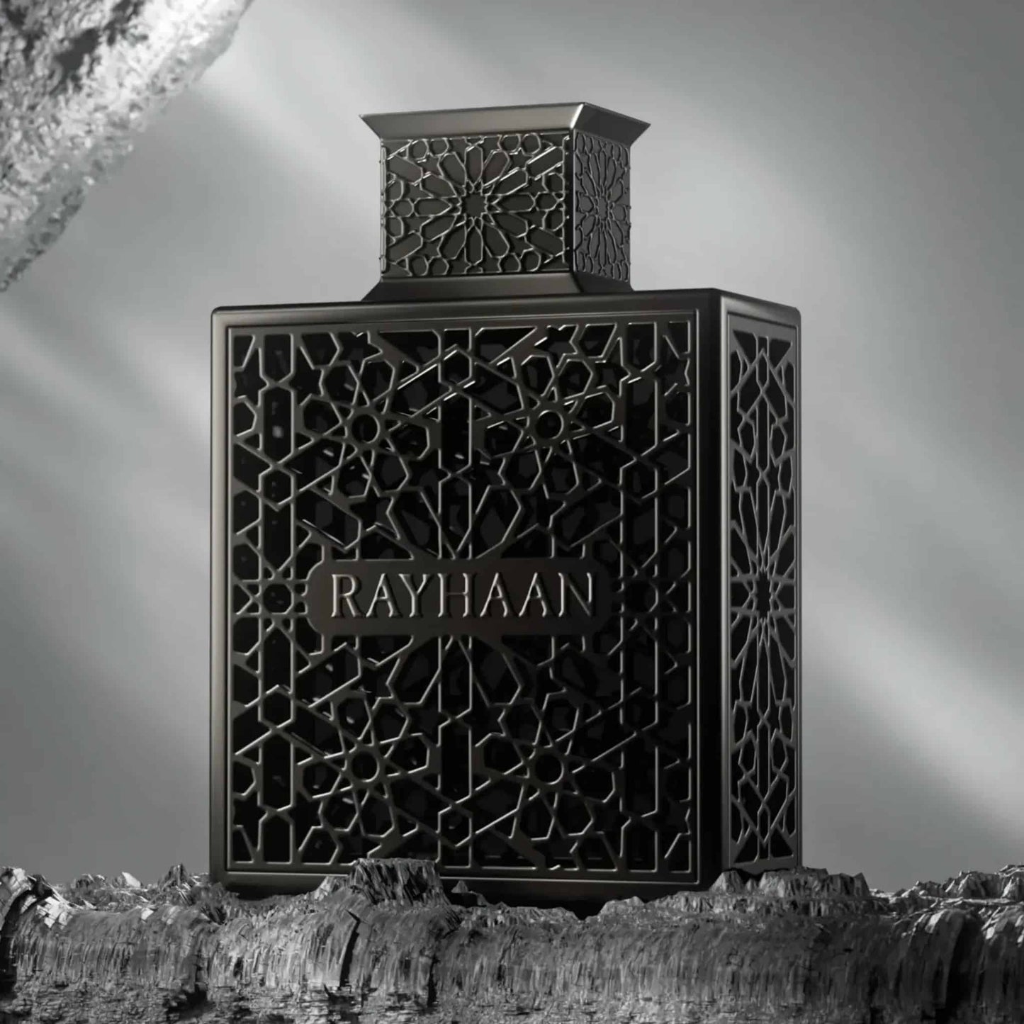 Black intricate design bottle labeled 'RAYHAAN' on a gray background