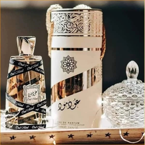 Oud Mood fragrance – bottle with ornate silver decorative jar