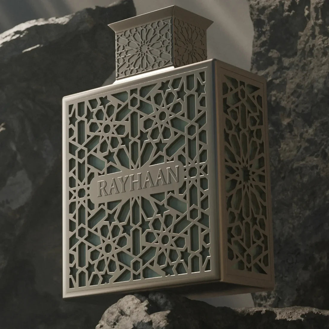 Decorative bottle with intricate patterns and 'RAYHAAN' branding against a dark background