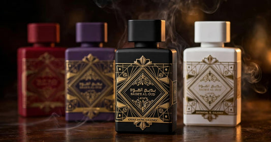 Badee Al Oud by Lattafa, the Oud for Glory, Amethyst, Honor and Glory and Sublime bottles together in warm evening light