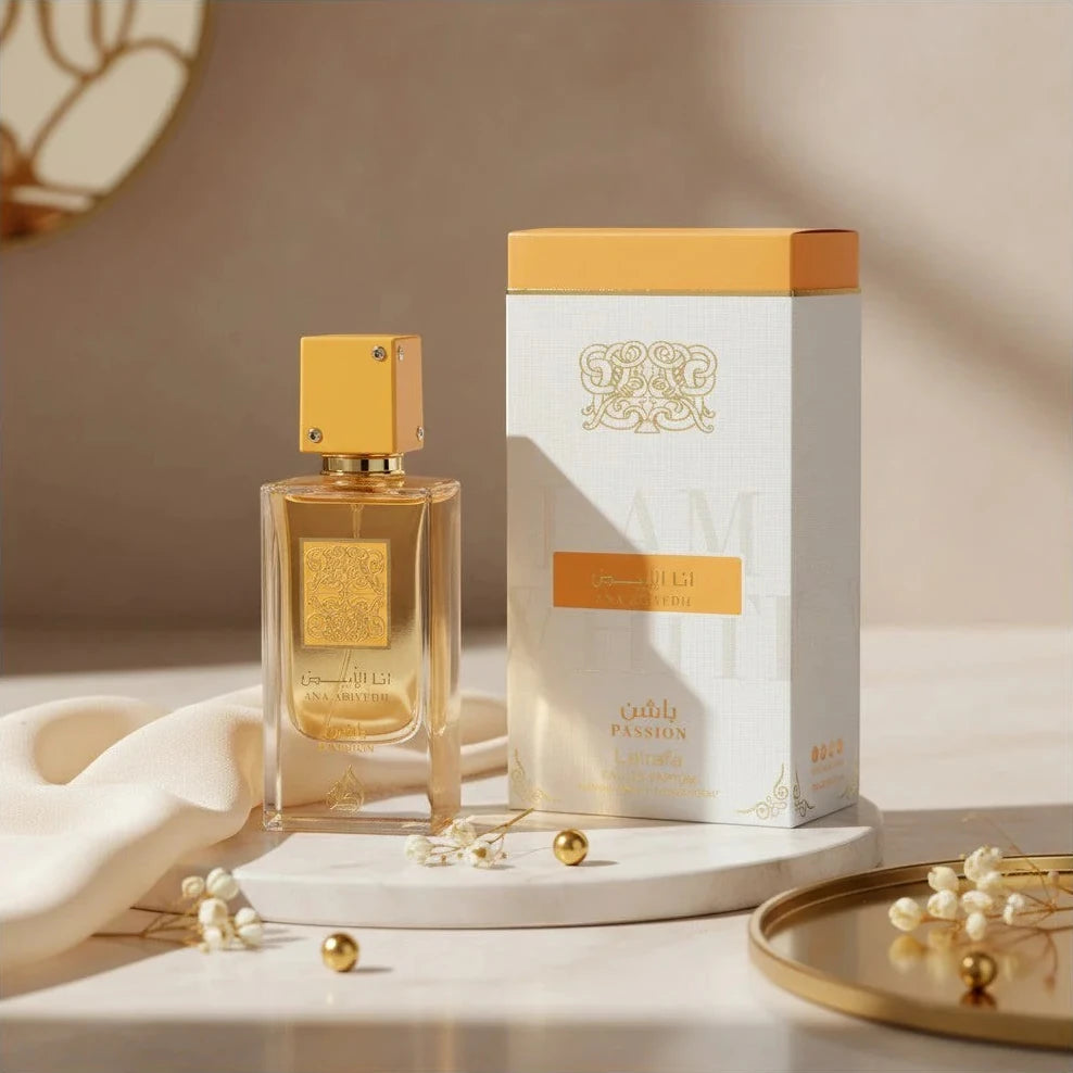 Ana Abiyedh Passion fragrance – box and bottle with warm light and pearls on marble