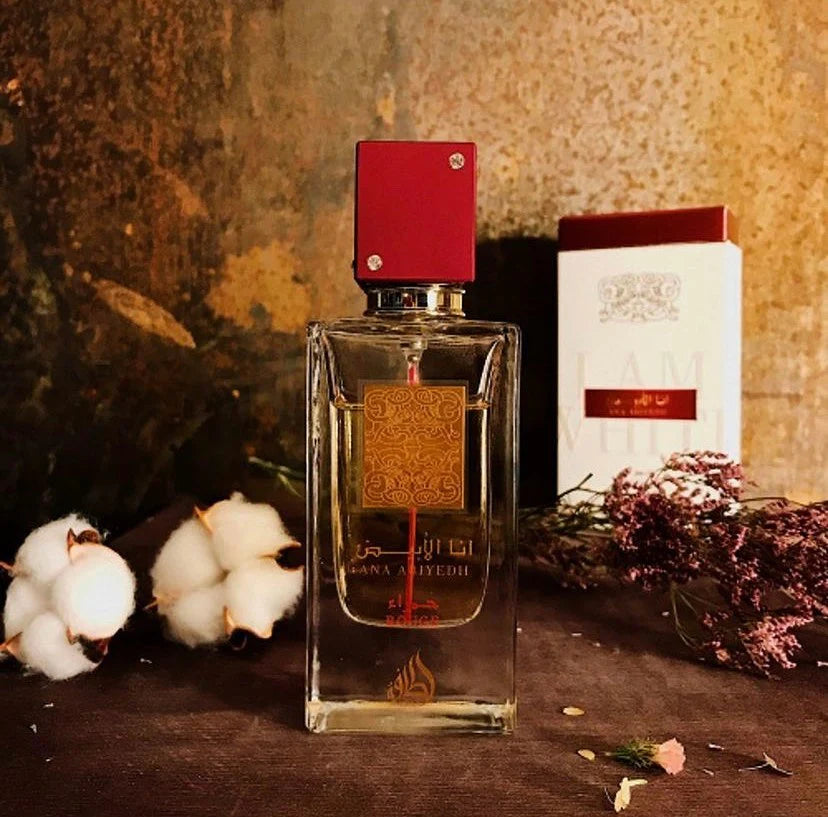 Ana Abiyedh Rouge fragrance – box and bottle with dried botanicals rustic setting