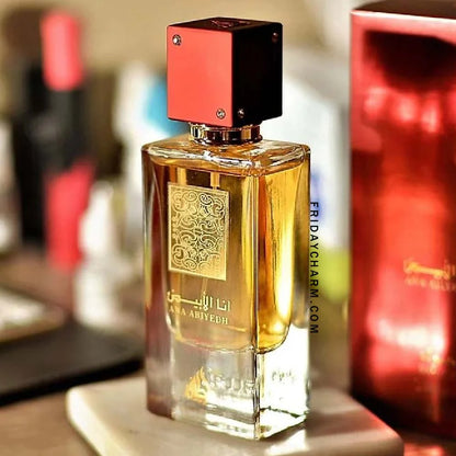 Ana Abiyedh Rouge fragrance – bottle close-up in warm amber light