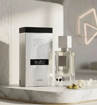 Ana Abiyedh White fragrance – box and bottle on marble with architectural detail
