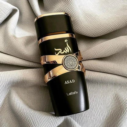 Asad fragrance – bottle on satin linen close-up