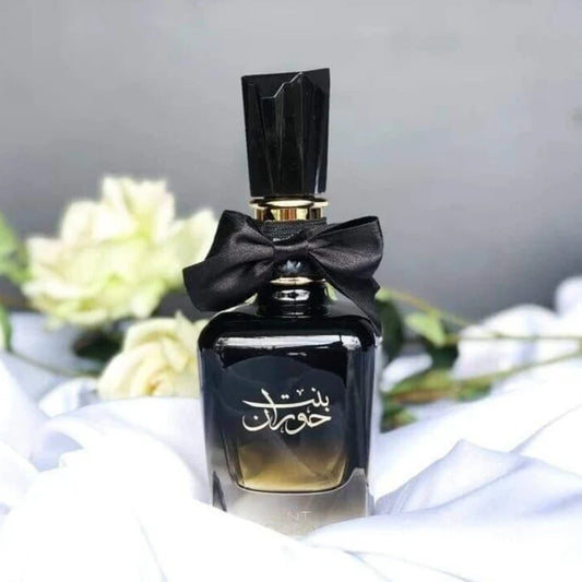Bint Hooran 100ml fragrance – bottle with white flowers lifestyle