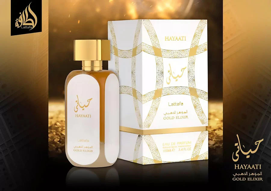 Hayaati Gold Elixir fragrance – box and bottle in golden atmospheric setting