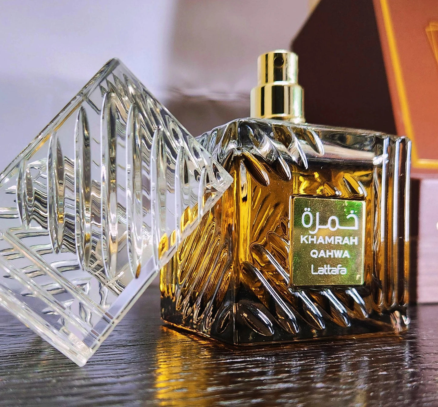 Khamrah Qahwa 100ml fragrance – bottle close-up with green label
