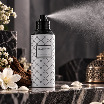 Majesty EDP spraying – bottle with jasmine flowers, wood and incense burner on marble
