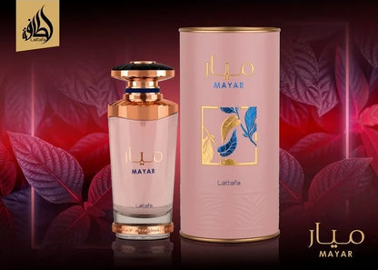 Mayar fragrance – tube and bottle in warm rose-toned setting