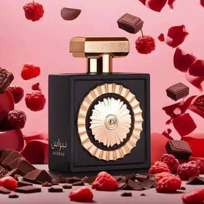Nebras 100ml fragrance – bottle with raspberries cherries and chocolate on pink background